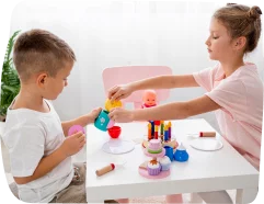 Two children at Step By Step Nursery in Dubai engaging in a cooperative play activity, fostering soft skills such as kindness, tolerance, and social interaction.