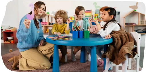 Children engaging in active learning activities at Step By Step Nursery in Mirdif, fostering creativity and hands-on exploration with teachers.