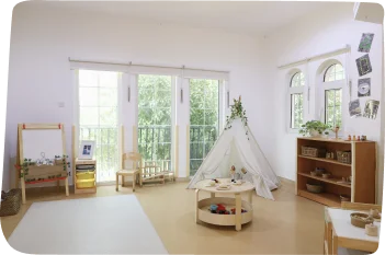 Classrooms at Step By Step Nursery in Dubailand, featuring dedicated learning areas with open-ended materials for independent play.